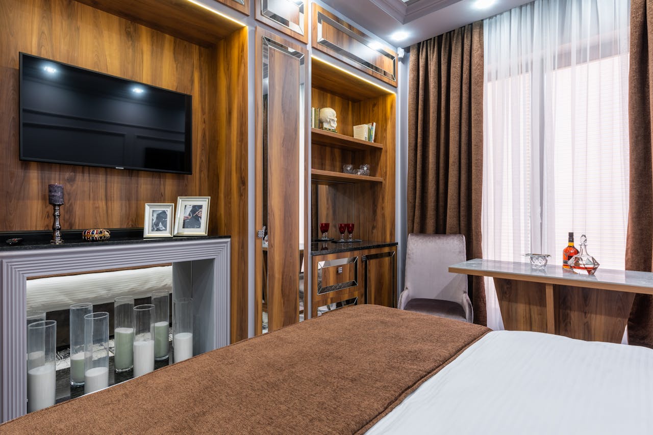 Stylish modern bedroom featuring elegant decor and ambient lighting.